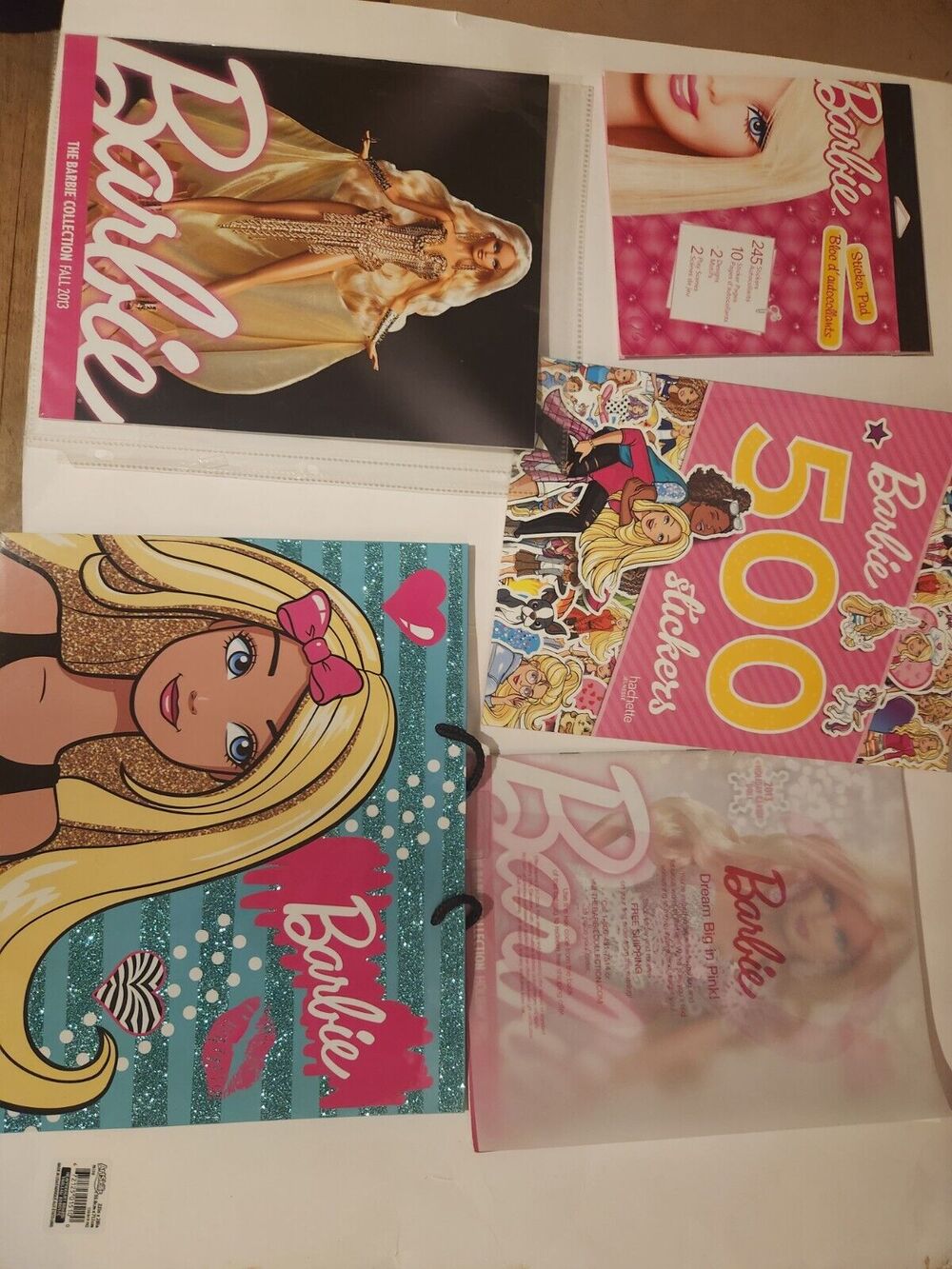 Barbie lot, sticker books, magazines, gift bag see photos